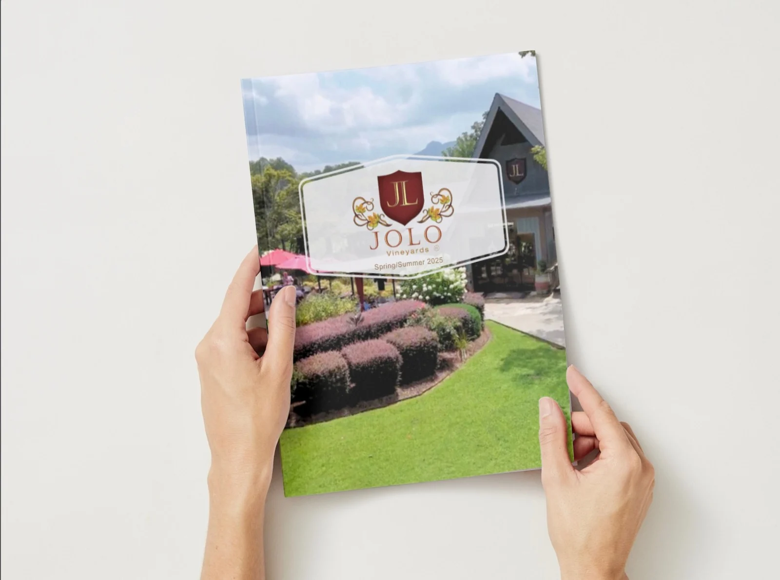A close up of a person holding Uncork magazine